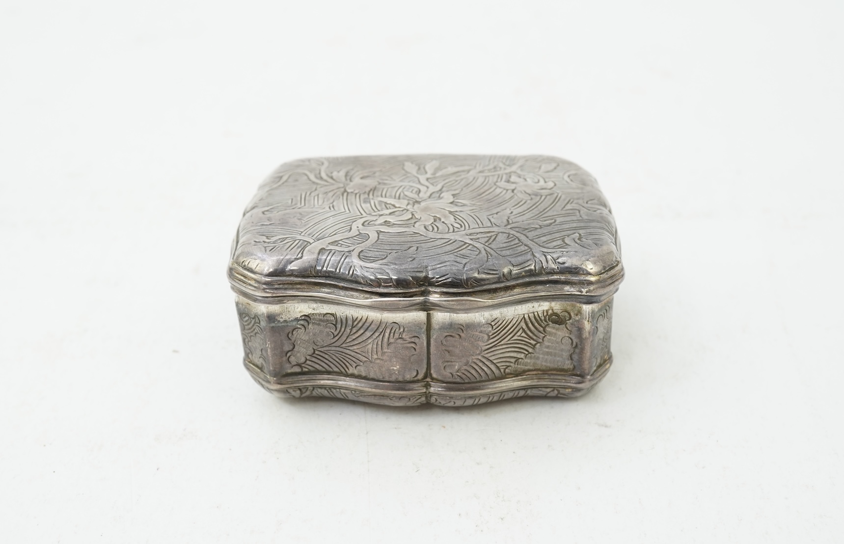 An early 19th century French white metal snuff box, with hinged cover